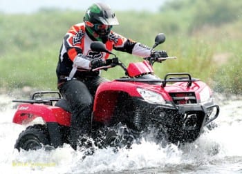 atv rider in water