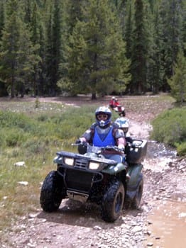 Jennifer on the Kawasaki Prairie 400